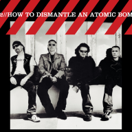 U2 feiern 20 Jahre „How To Dismantle An Atomic Bomb“ mit Reissue und neuem Schattenalbum